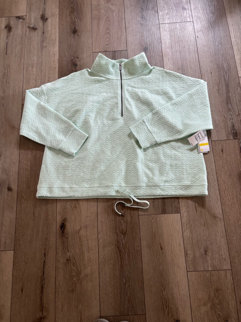 Zella Revive Half Zip Sweatshirt in a light green color